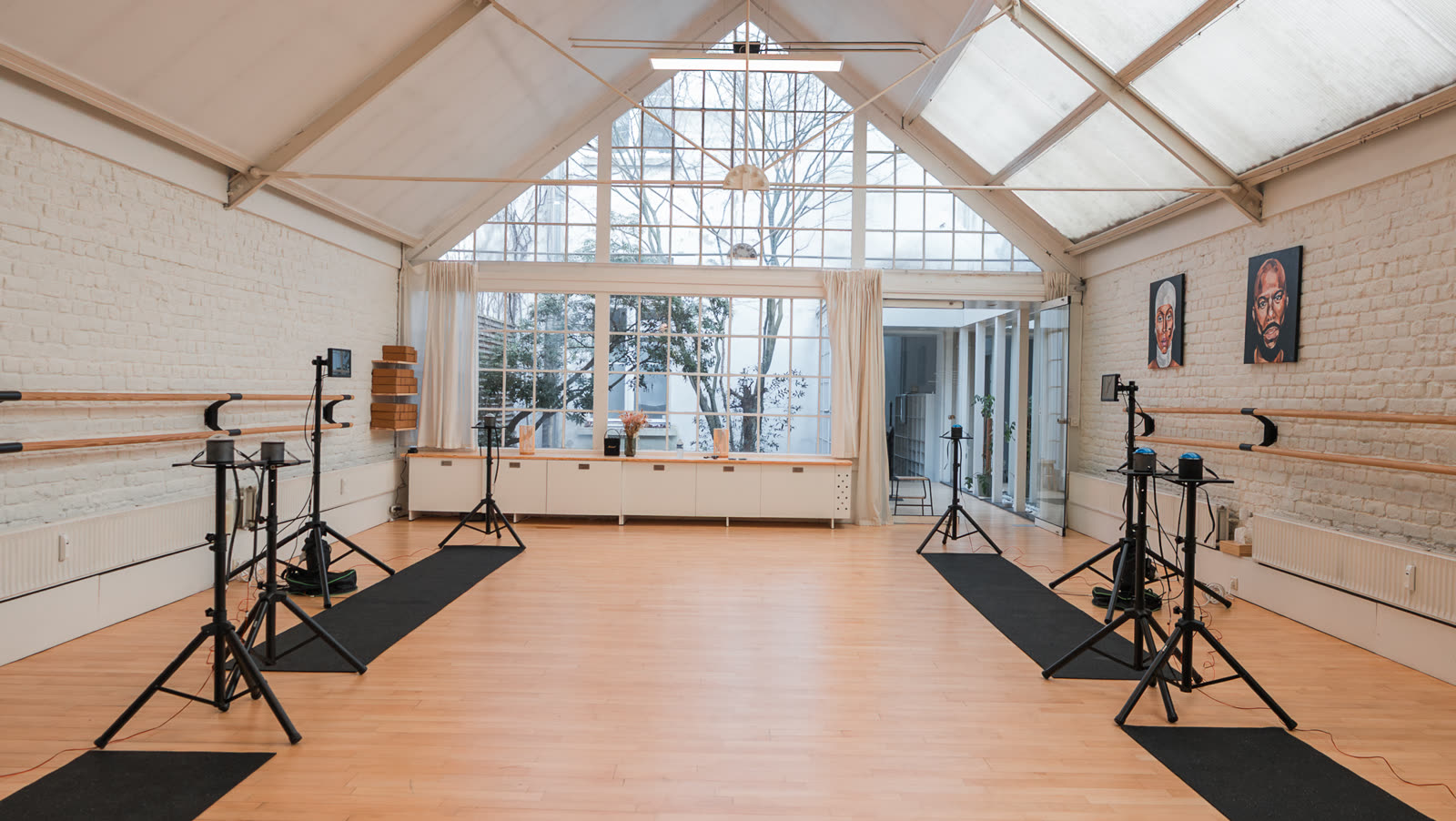 Interior of Lokahi Holistic Studio set up with the Cogniflux Lab station fleet, viewed from across the room.